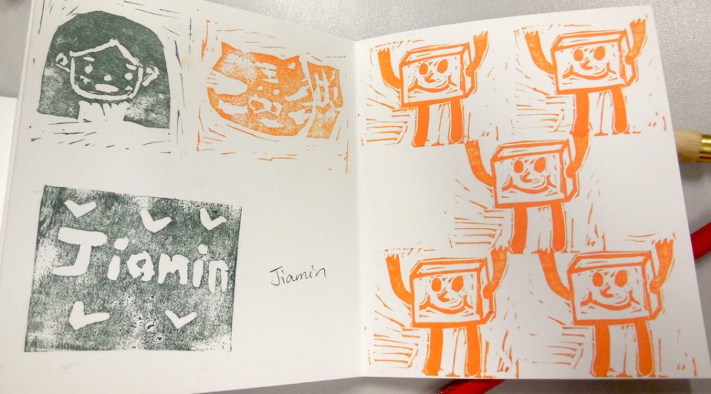 Pages printed with students' hand carved rubber stamps
